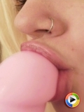 Watch as Luna teases with a close up view of her oral skills on her pink dildo